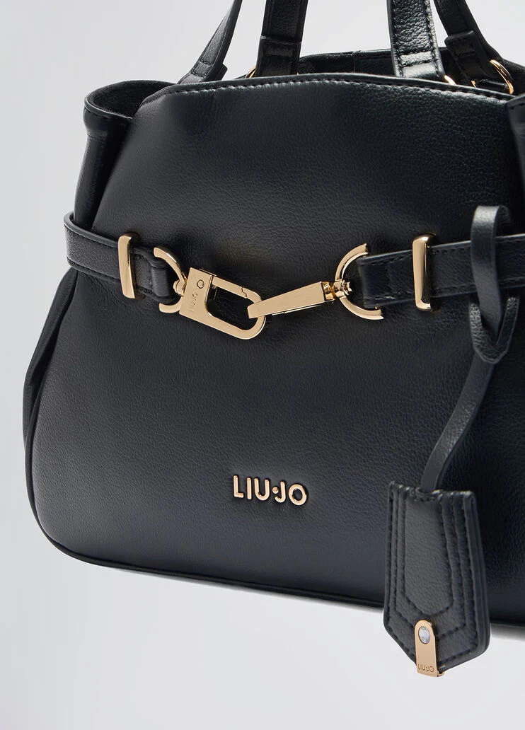 Black handbag with charm