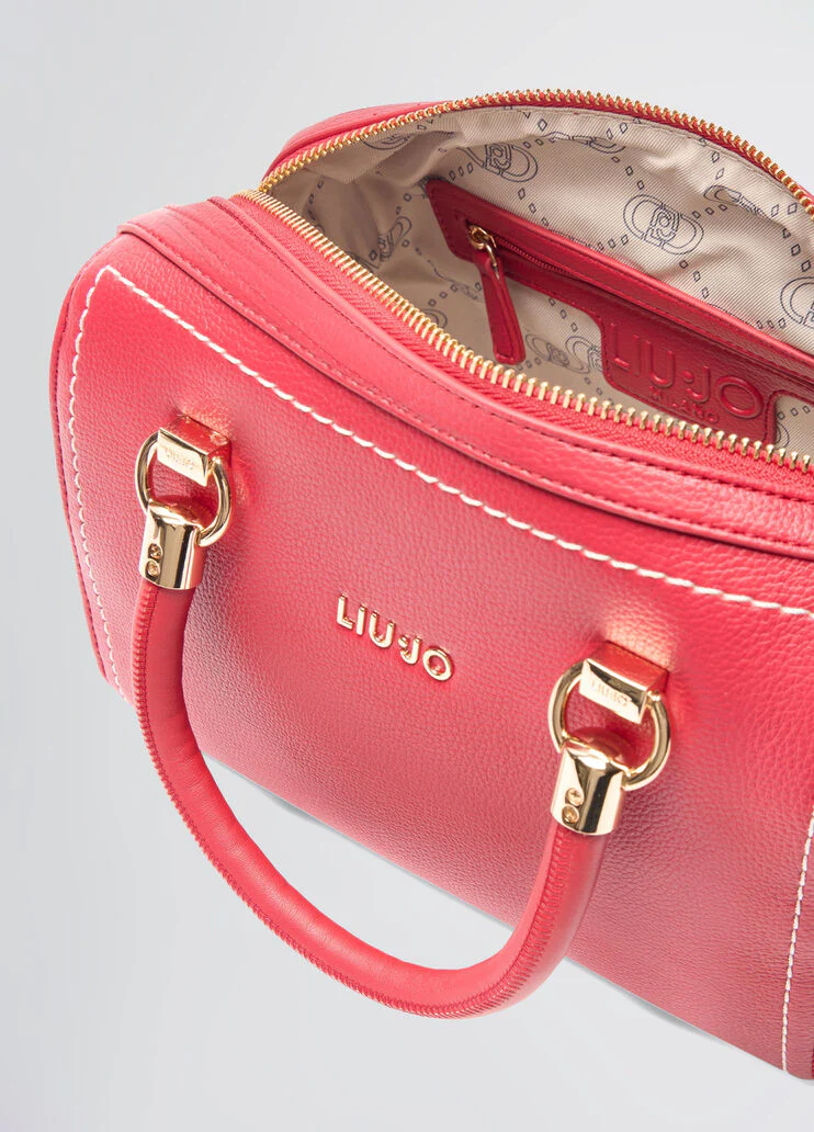 Handbag with matching clutch