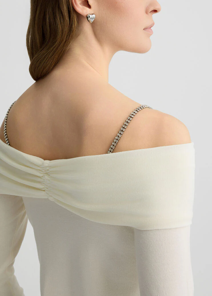 Off-the-shoulder jumper with bejewelled gemstones