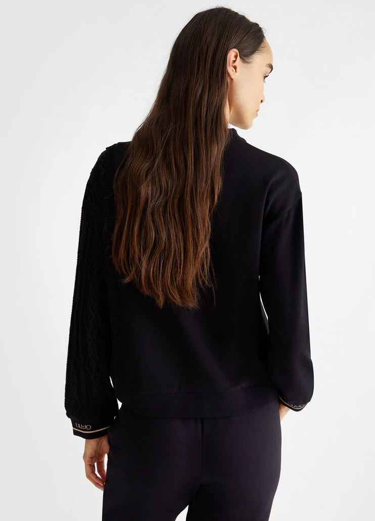 Black sweatshirt with knit insert