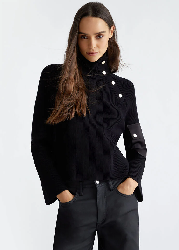 Sweater with buttons and pocket