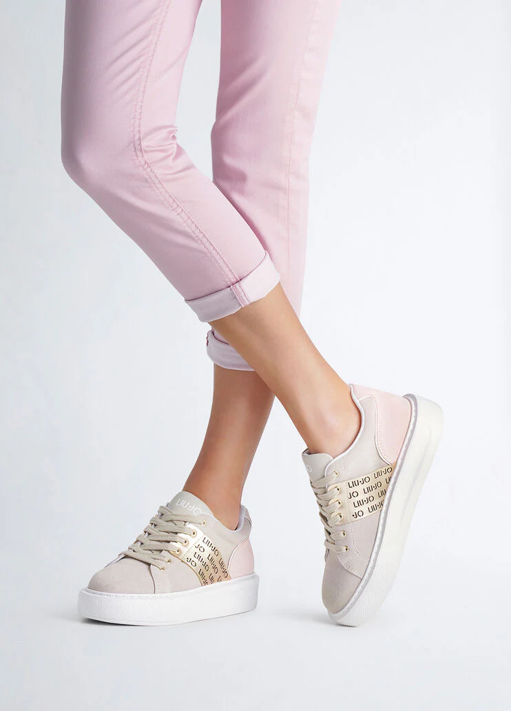 Sneakers with perforated logo