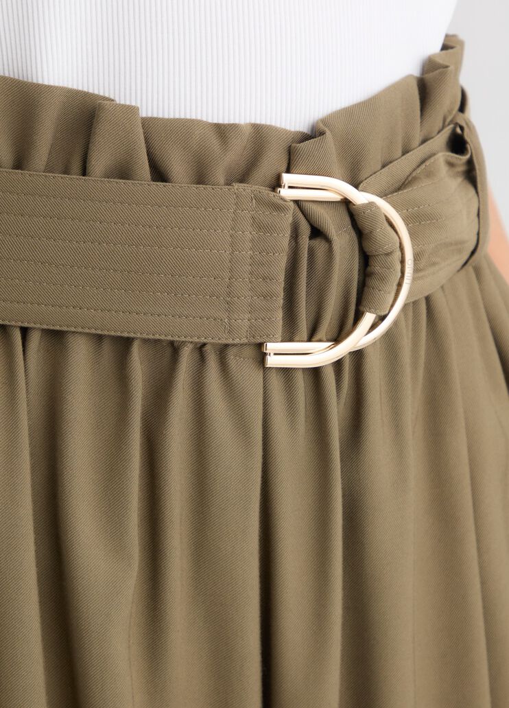 Green Bermuda shorts with belt