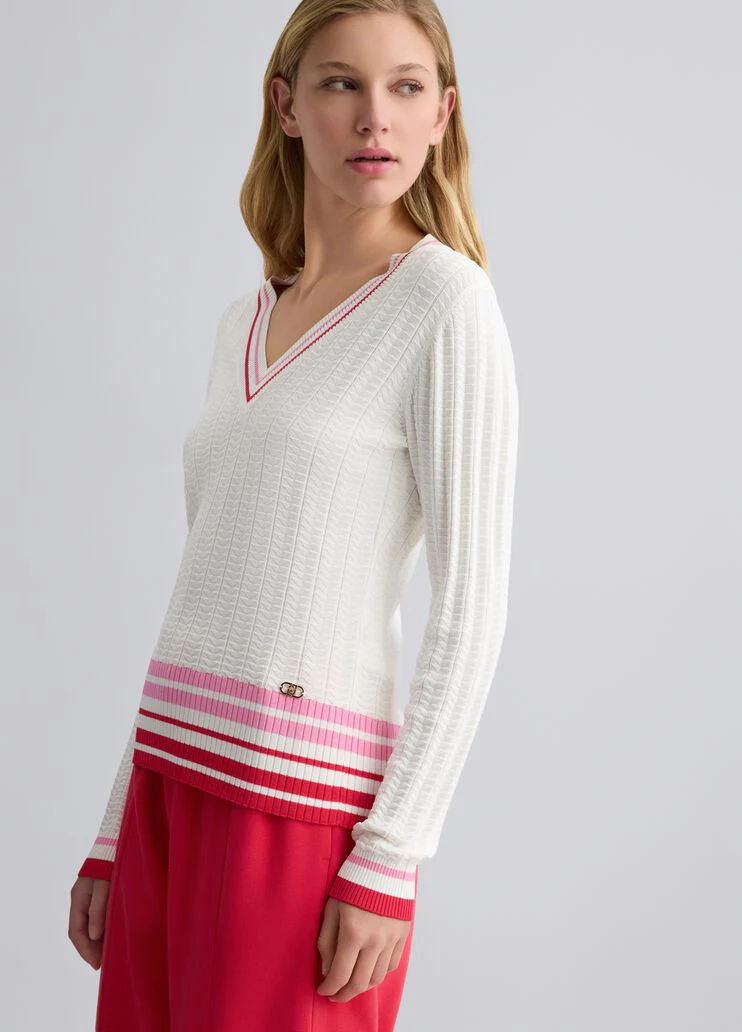 White jumper with colourful stripes