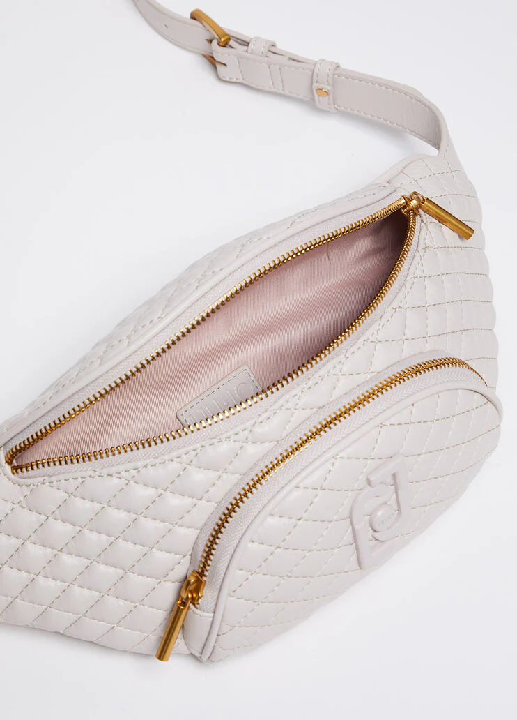 Quilted belt bag with charm