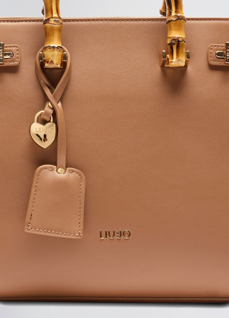 Bag with bamboo-finish handles