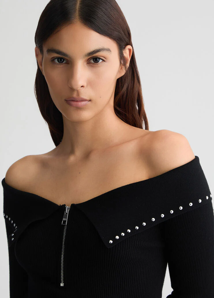 Top with zip and studs