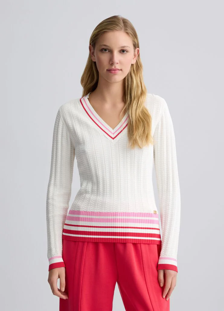 White jumper with colourful stripes