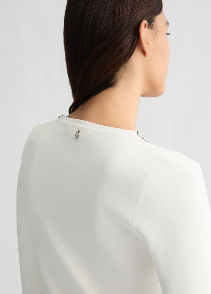 Jumper with gemstones