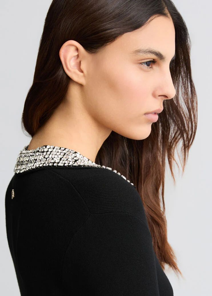 Black polo shirt with bejewelled embellishment