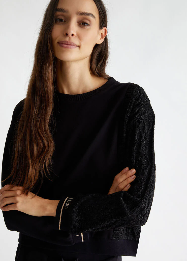 Black sweatshirt with knit insert