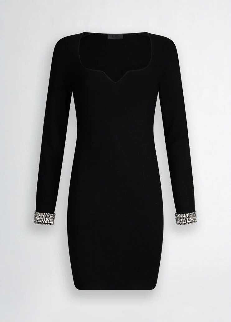 Short black dress with bejewelled embellishment