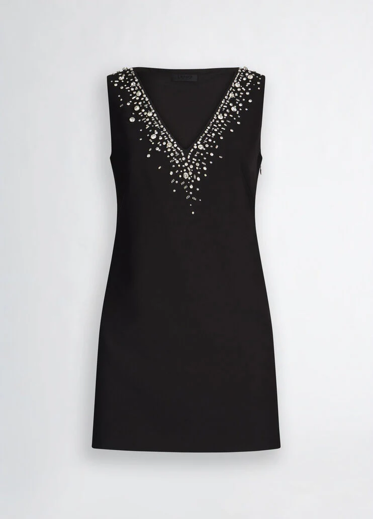 Short black dress with bejewelled embellishment