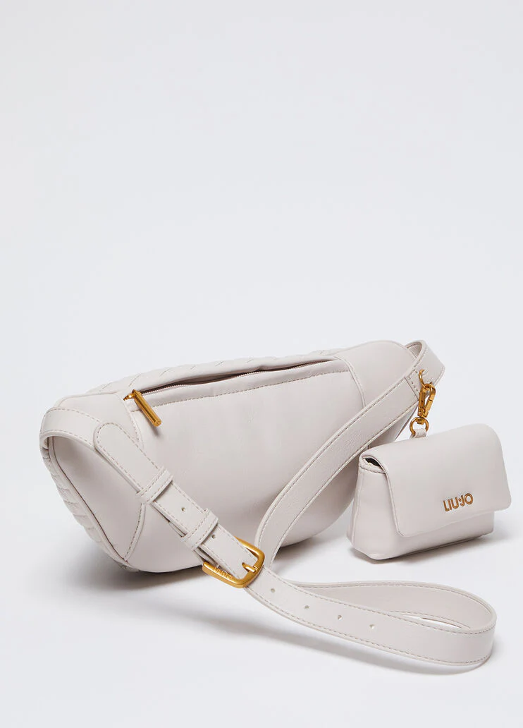 Quilted belt bag with charm