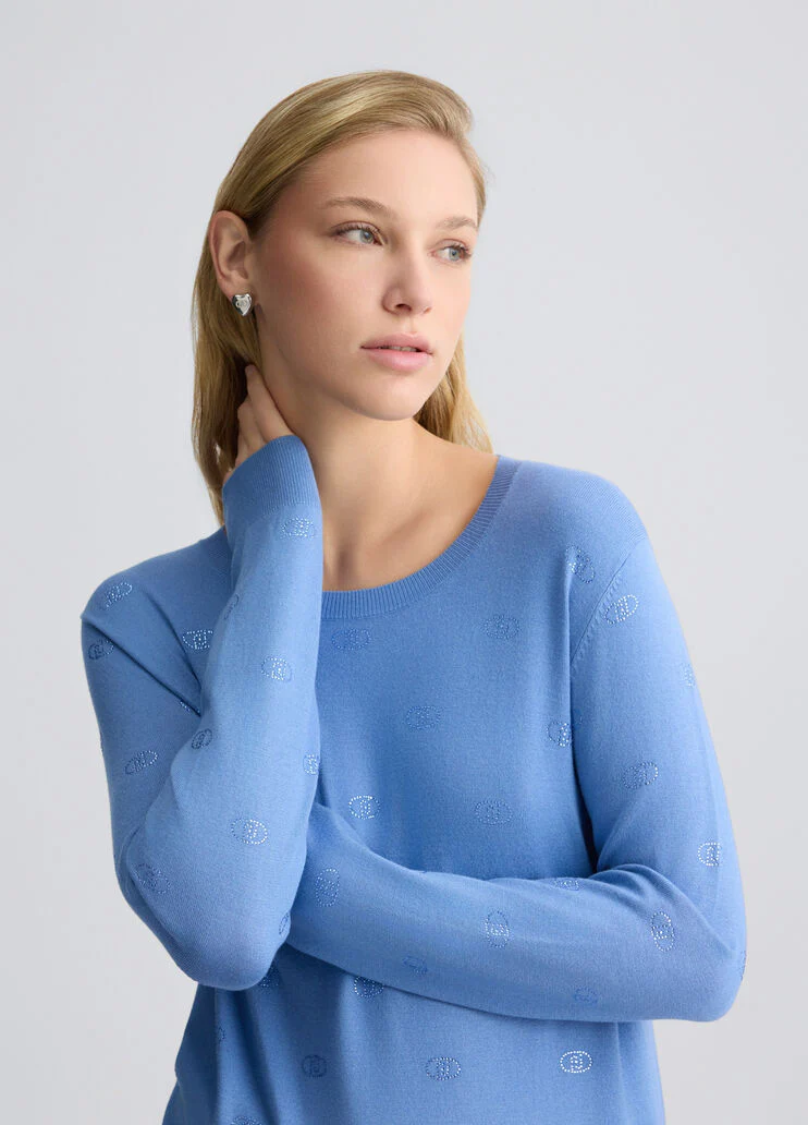 Top with logo and gemstones