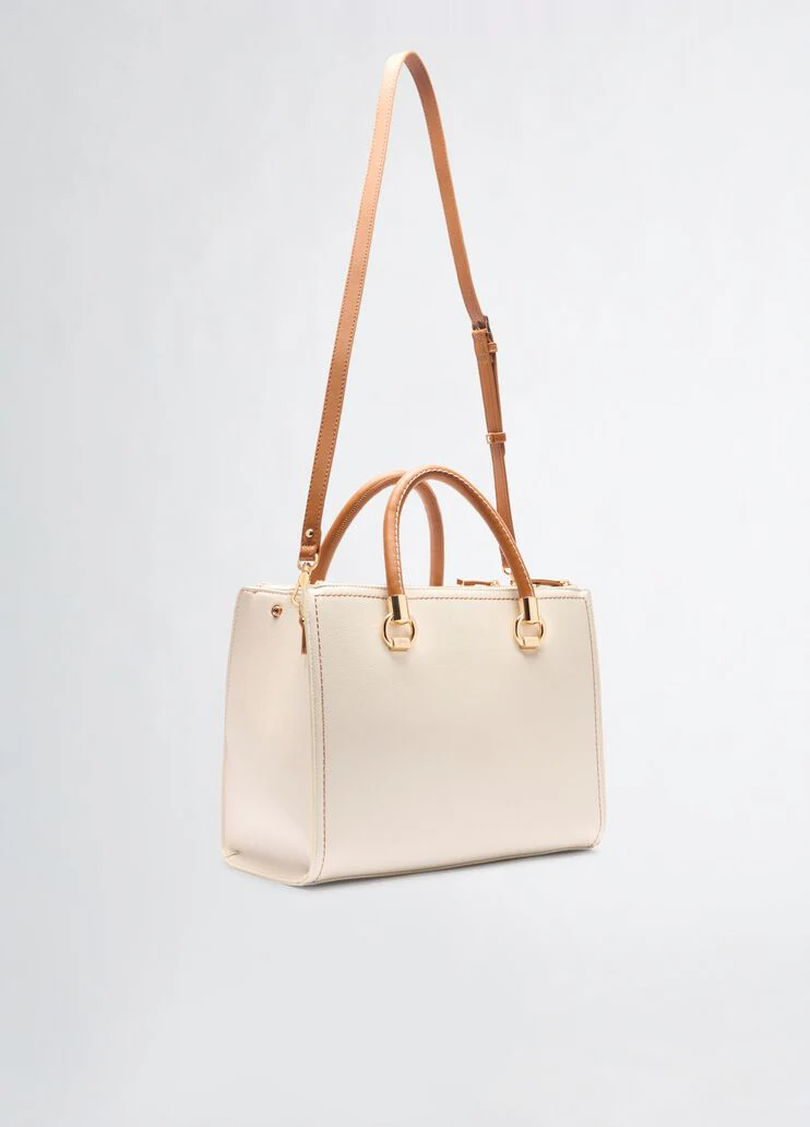 White and brown handbag
