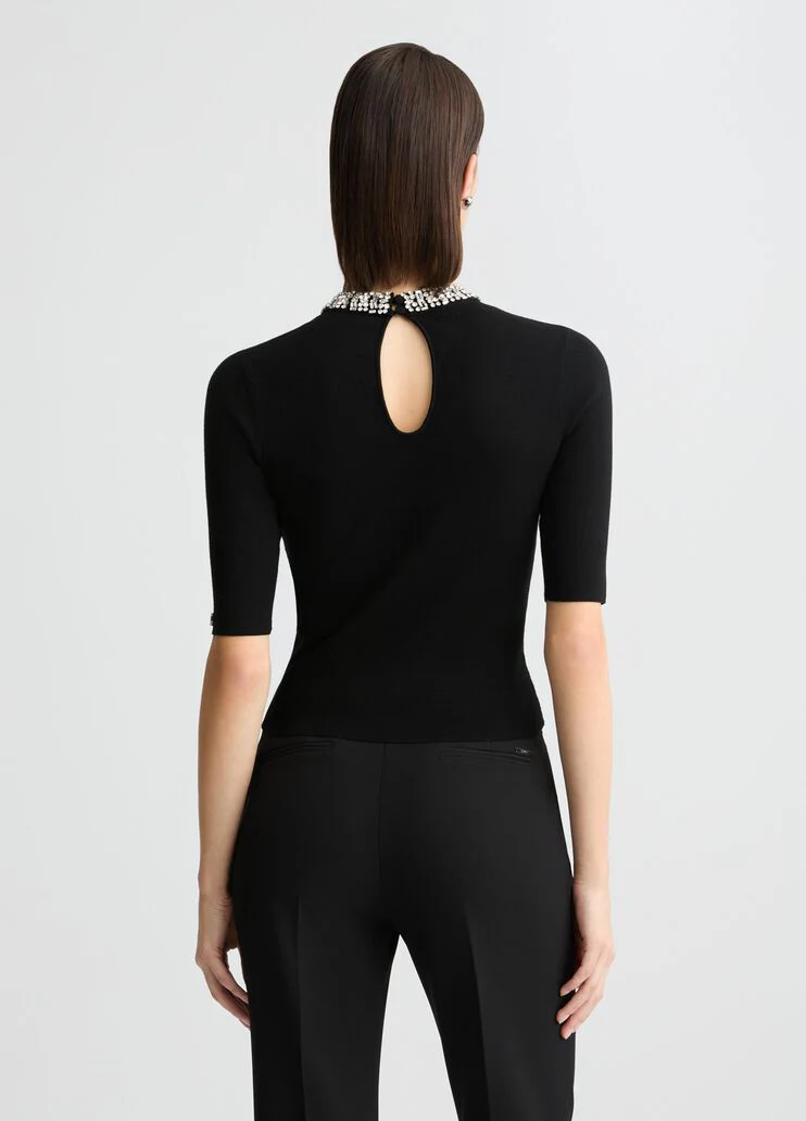 Black crop top with bejewelled embellishment