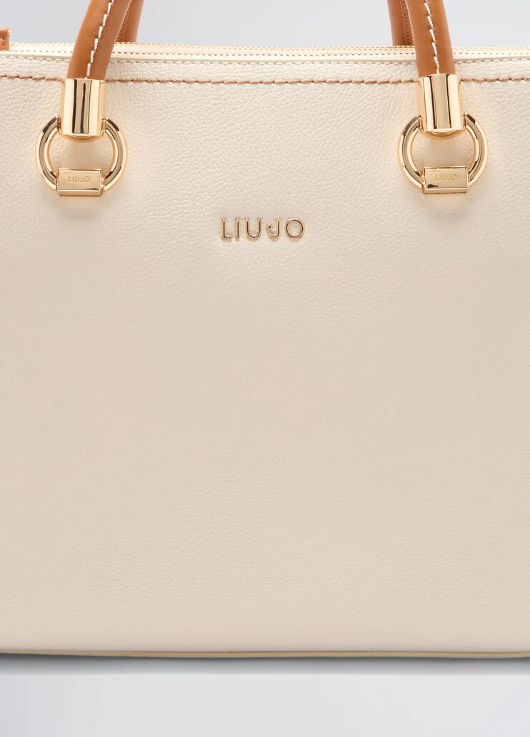 White and brown handbag