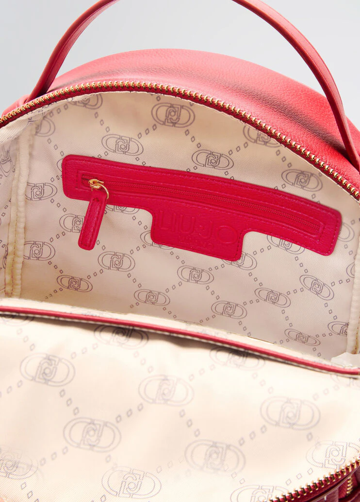 Tumbled backpack with clutch bag