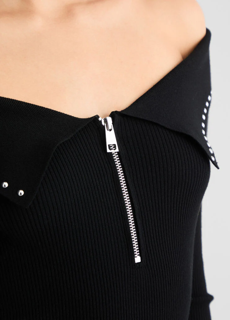 Top with zip and studs