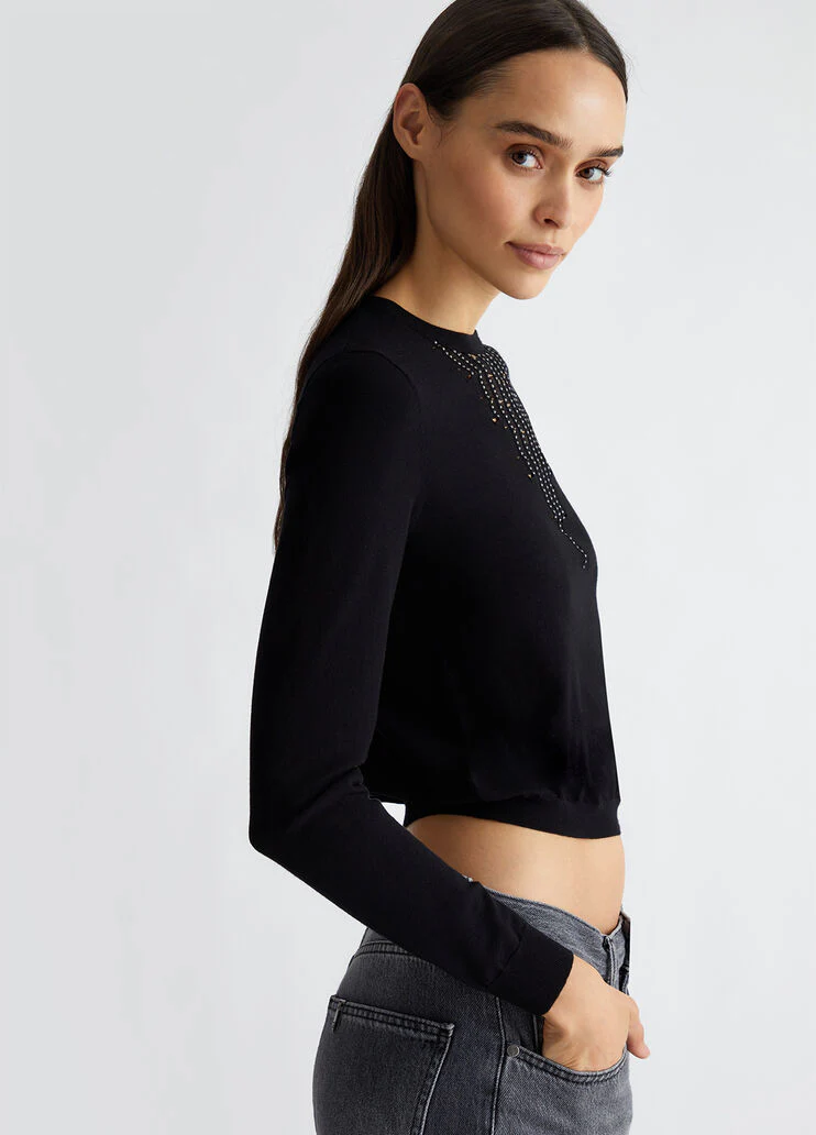 Jumper with gemstones