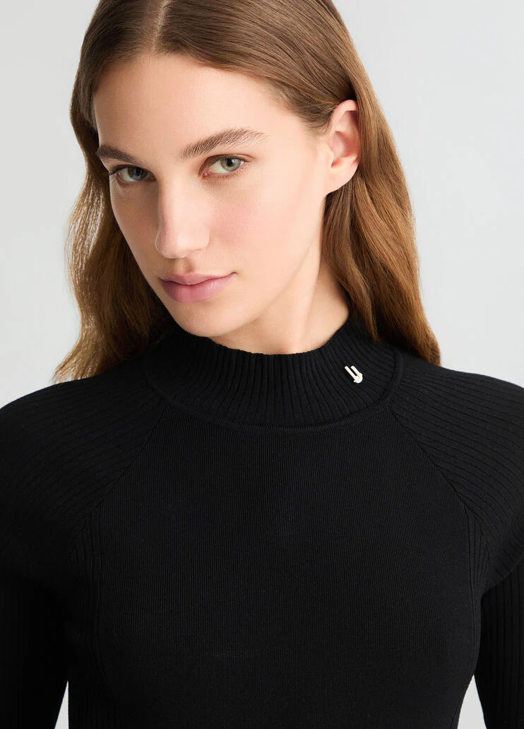 Black knit dress with cut-out