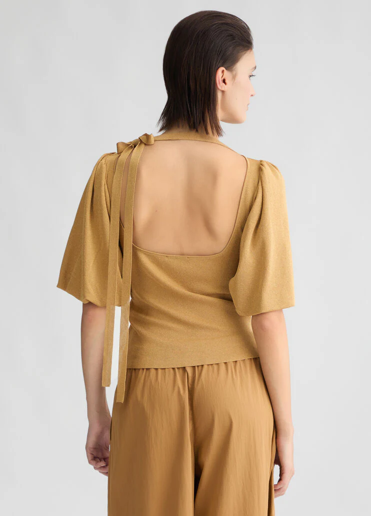 Gold top with cut-out detailing