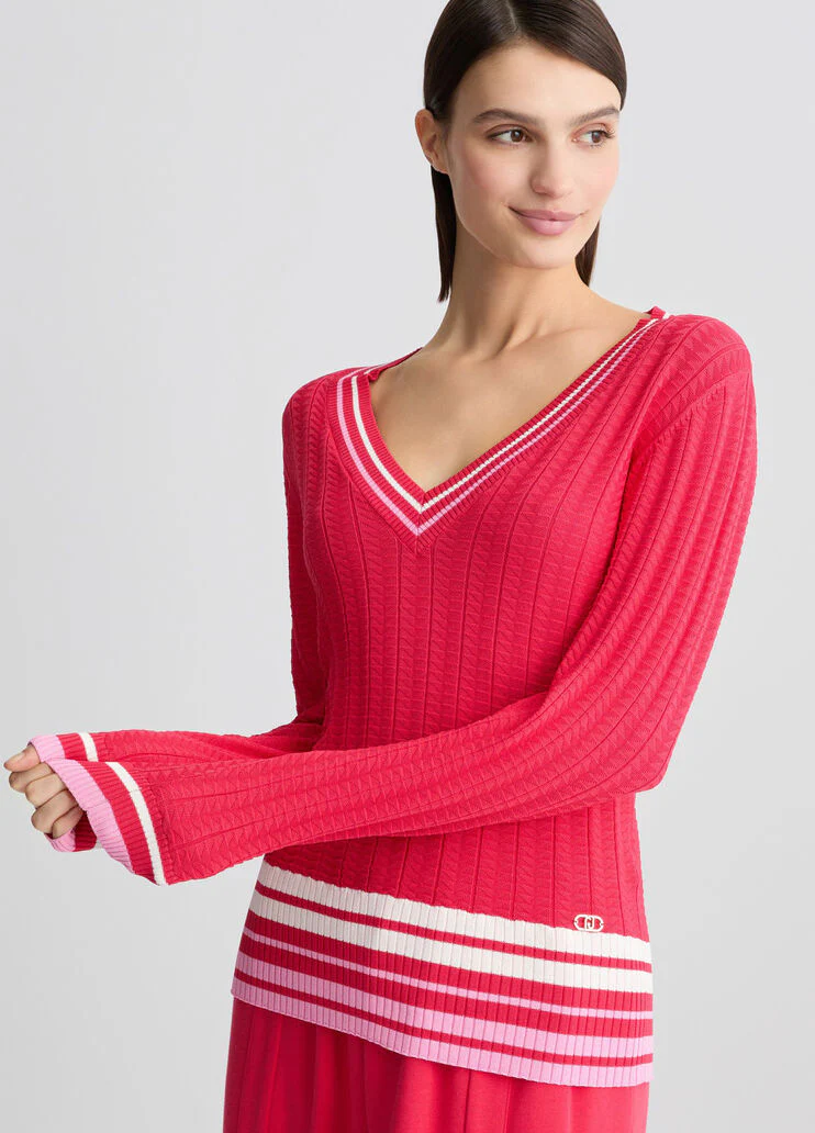 White jumper with colourful stripes