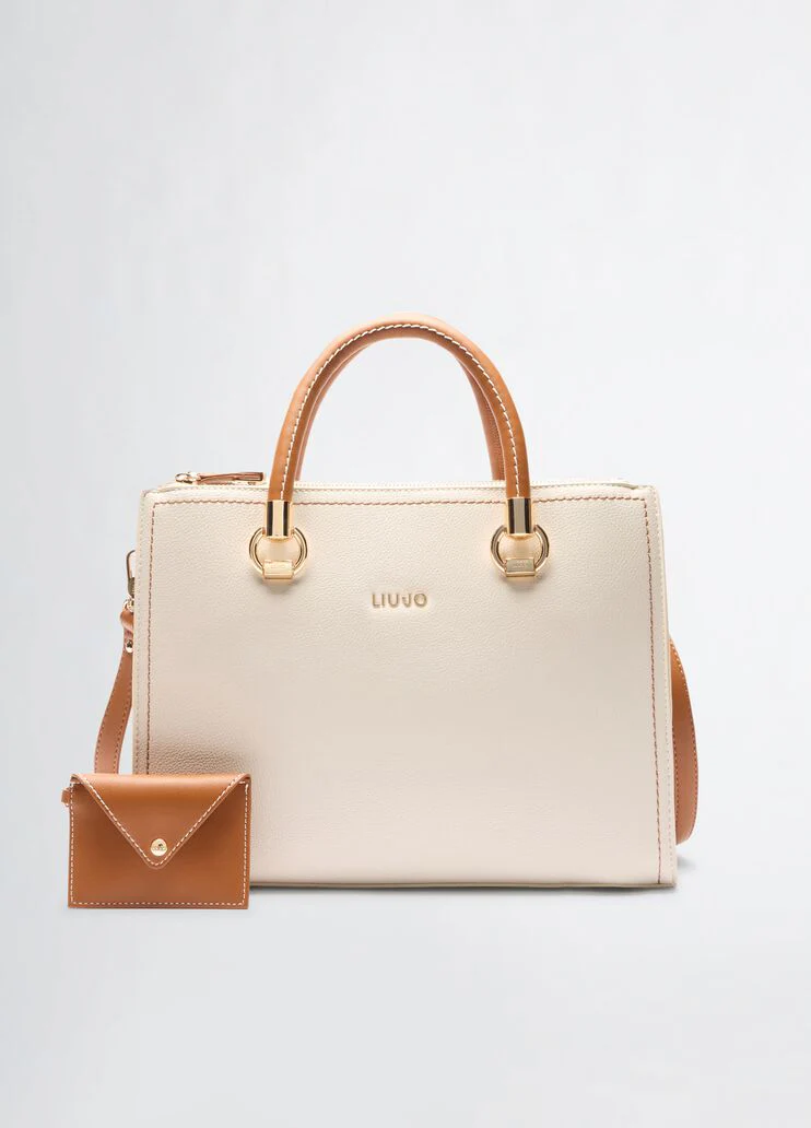 White and brown handbag