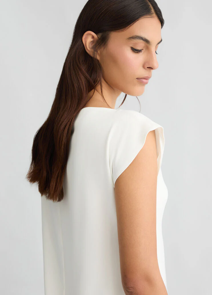 Short white dress with draping