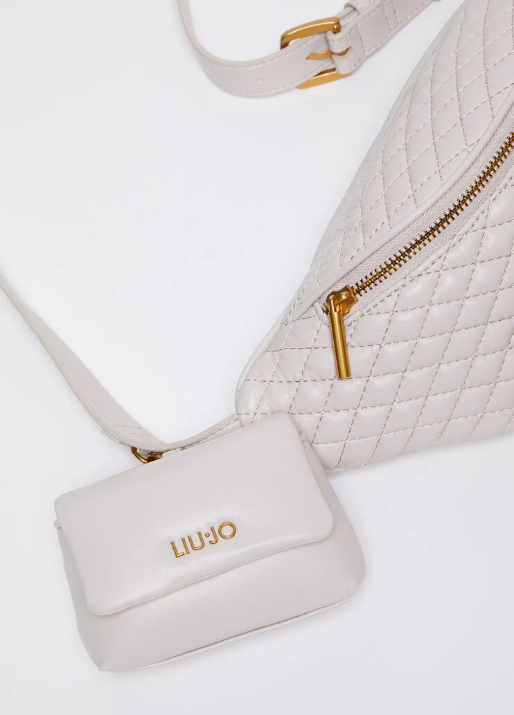 Quilted belt bag with charm