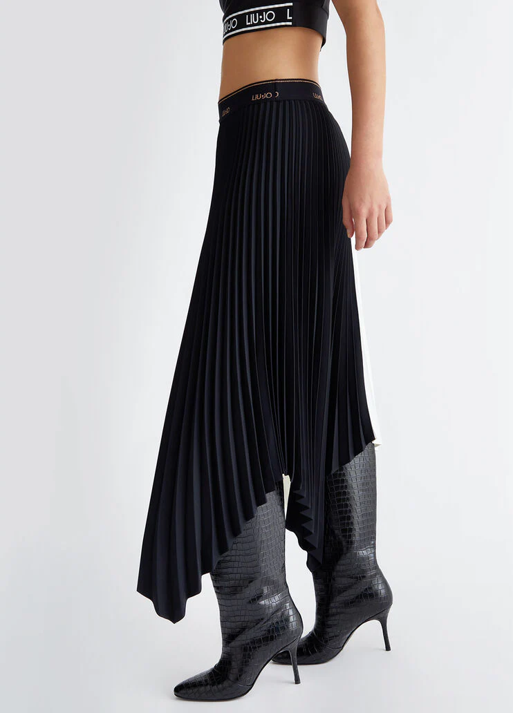 Pleated asymmetrical skirt