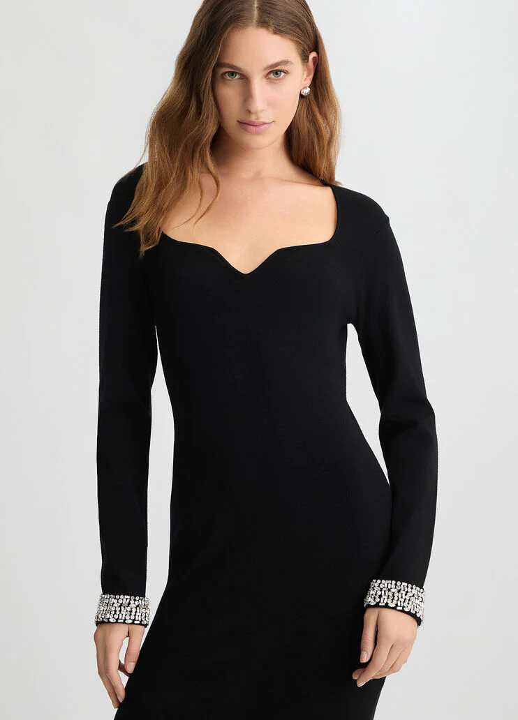 Short black dress with bejewelled embellishment