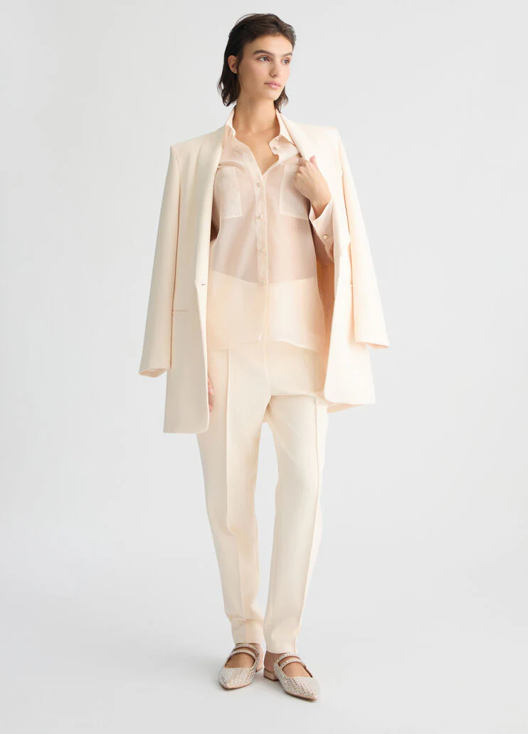 Cream cigarette trousers