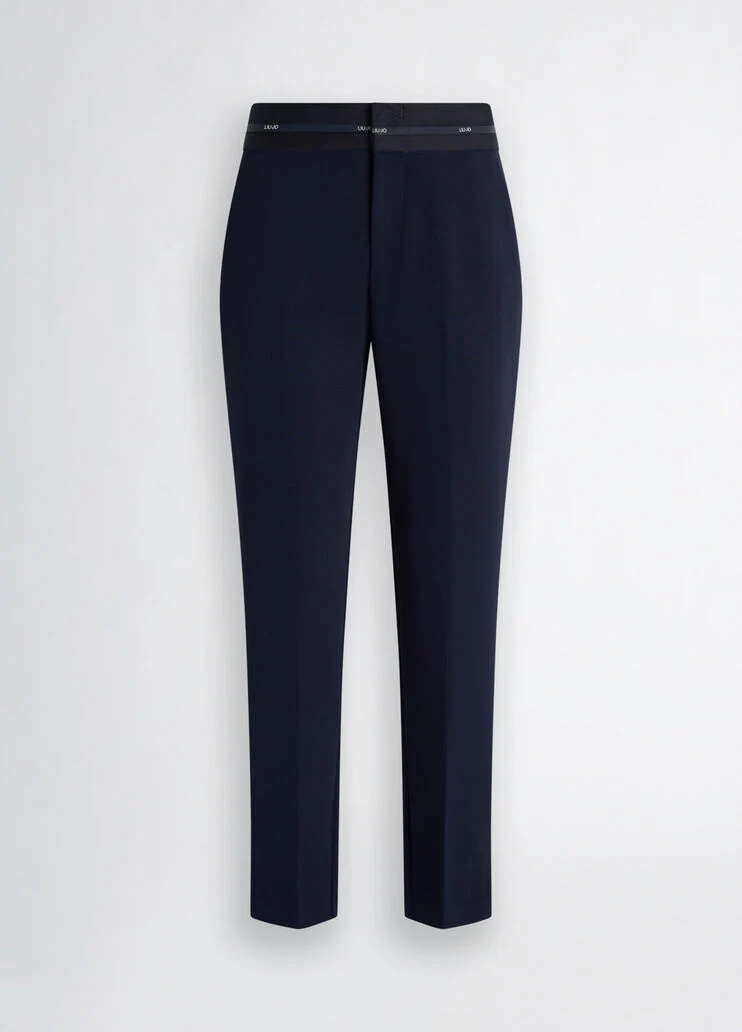 Trousers with branded waistband