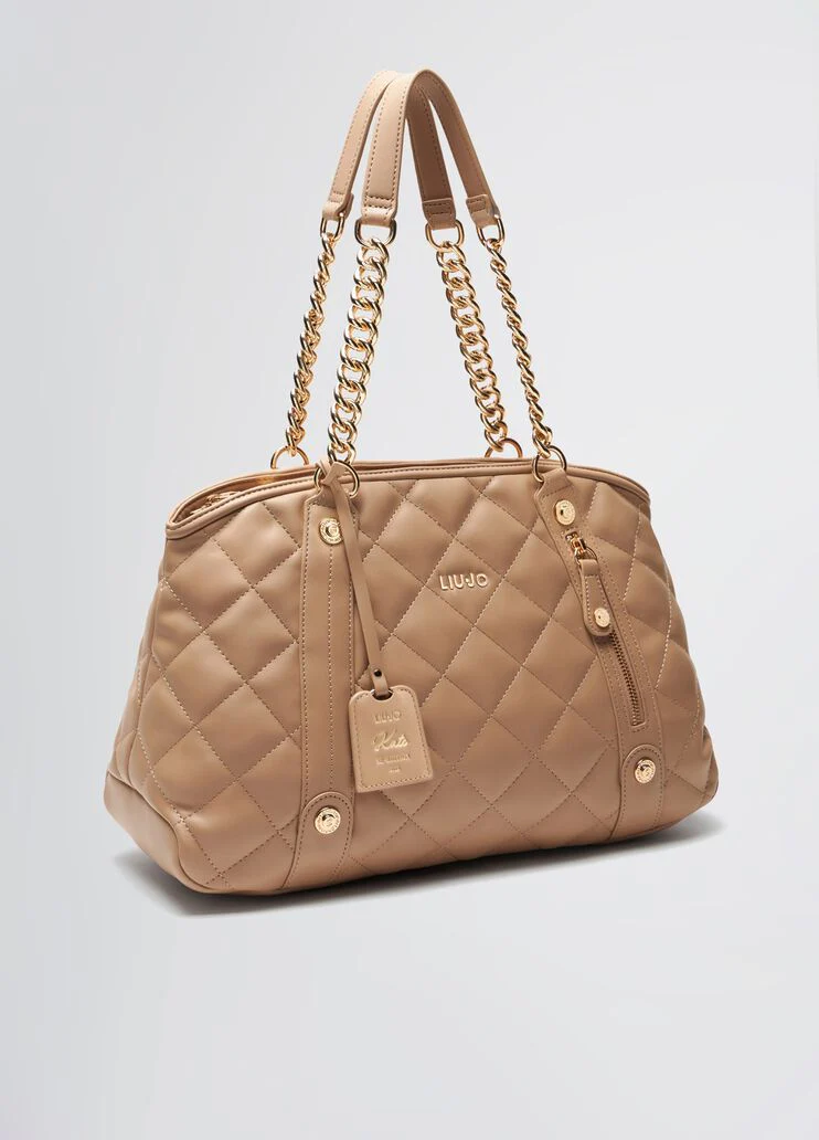 Quilted pink handbag