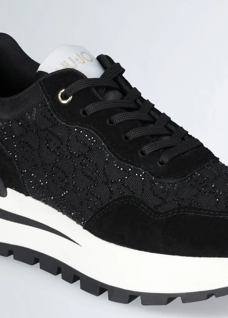 Black sneakers with rhinestone-detailed logo