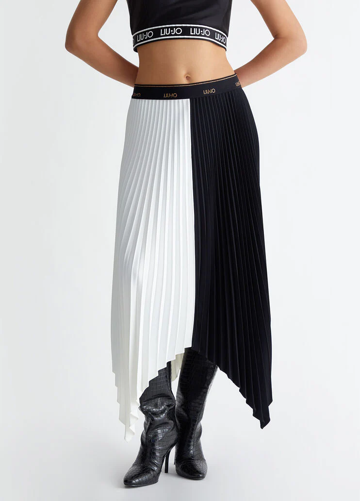 Pleated asymmetrical skirt