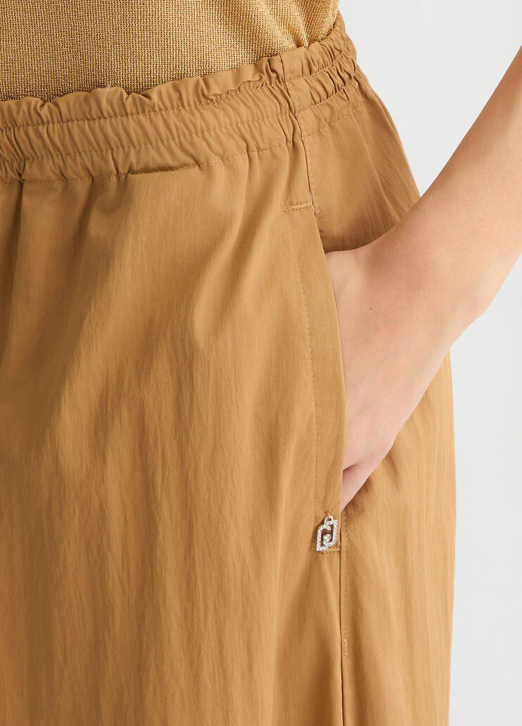 Nylon flare trousers