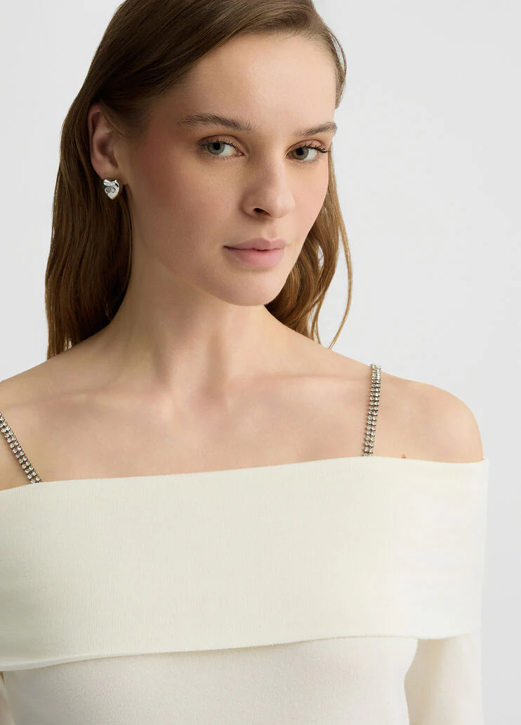 Off-the-shoulder jumper with bejewelled gemstones