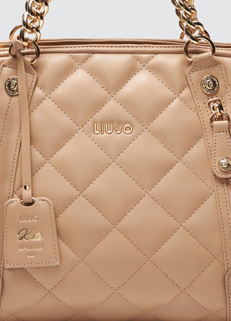 Quilted pink handbag