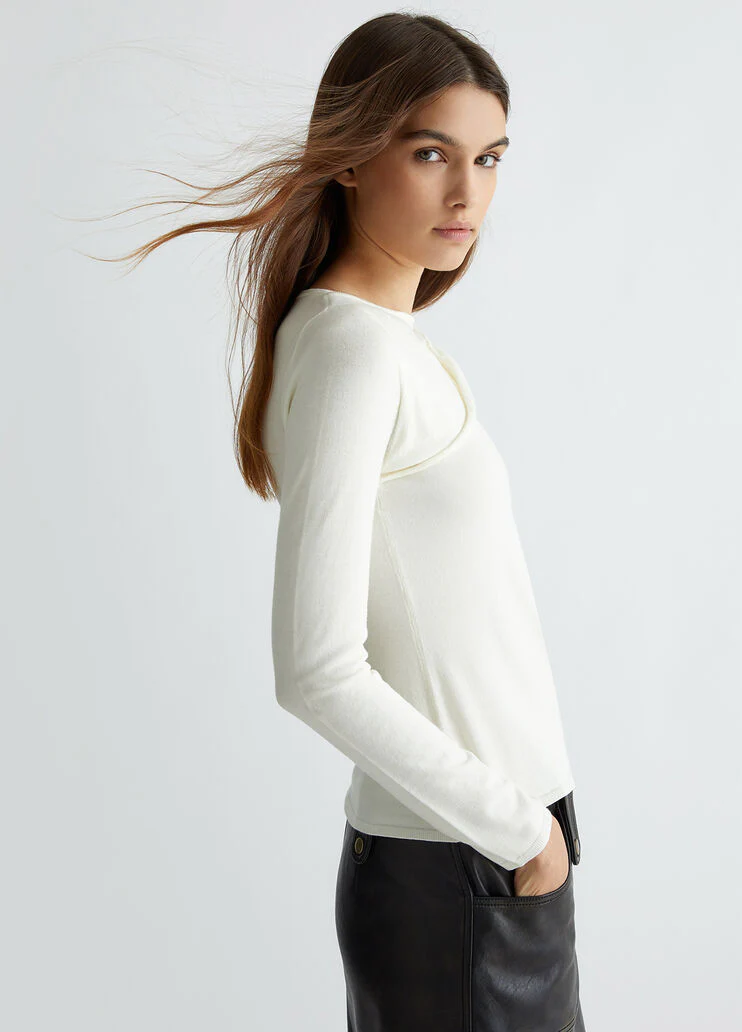 White jumper with cut-out
