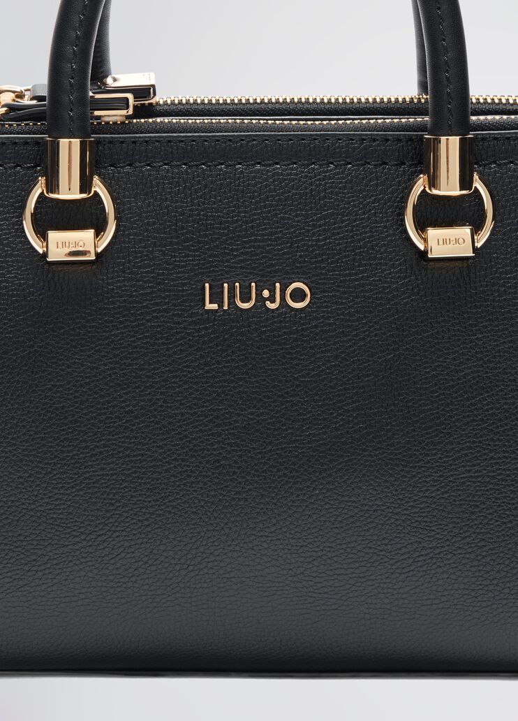 Handbag with matching clutch