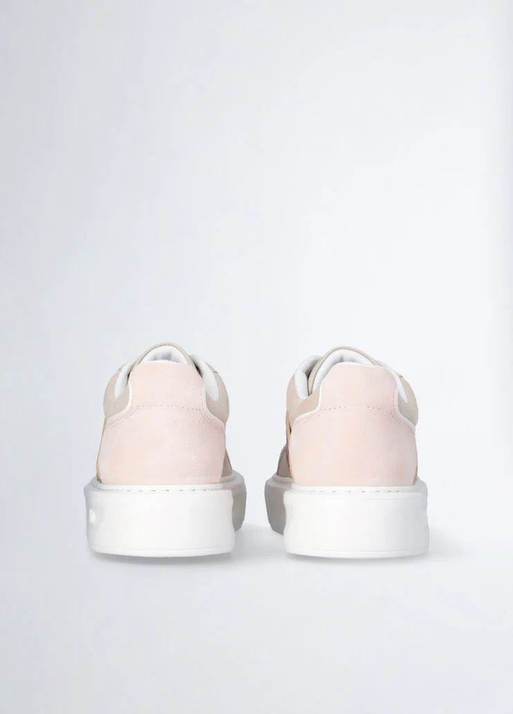 Sneakers with perforated logo