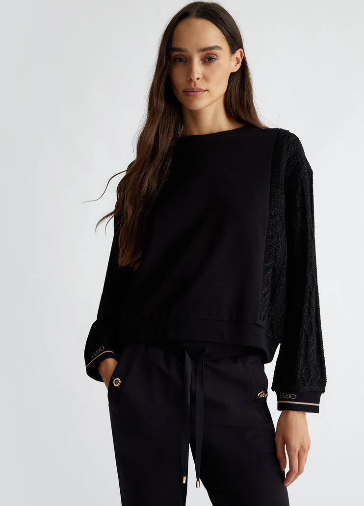 Black sweatshirt with knit insert