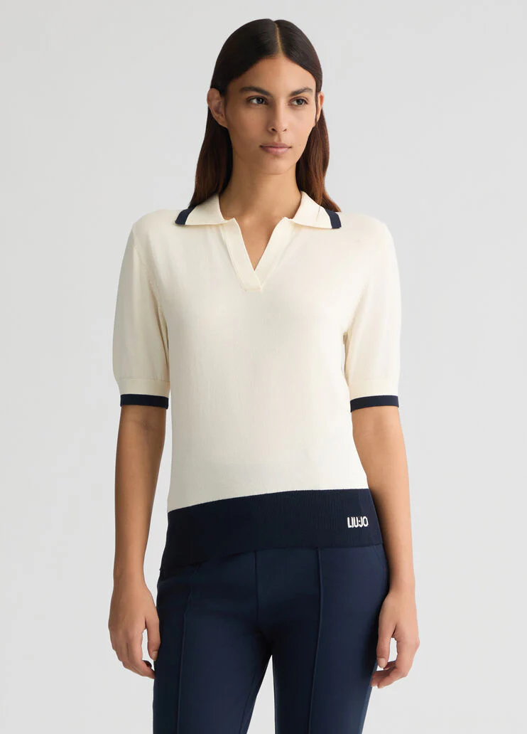 White jumper with details