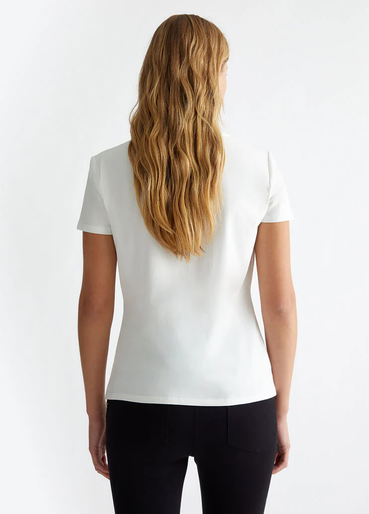 T-shirt with print and appliqués