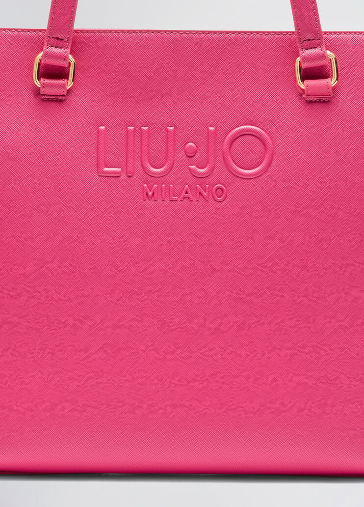 Bright pink shopping bag