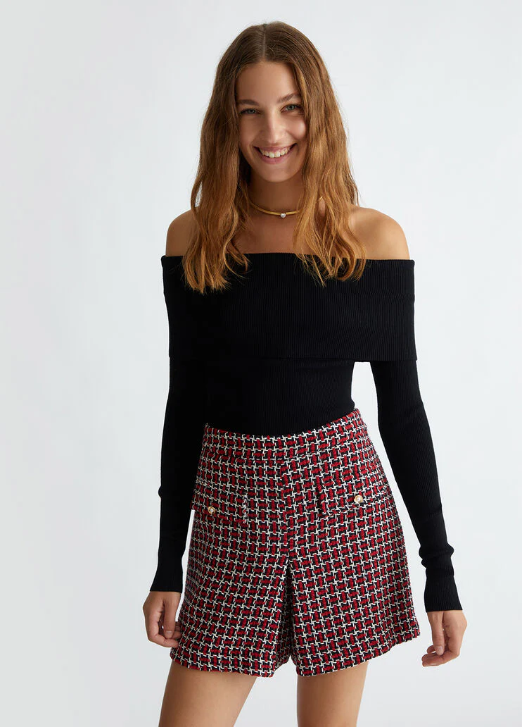 Black off-the-shoulder jumper