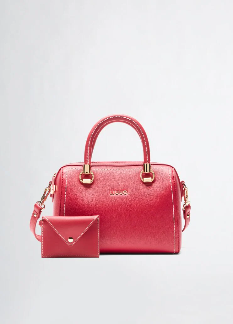 Handbag with matching clutch